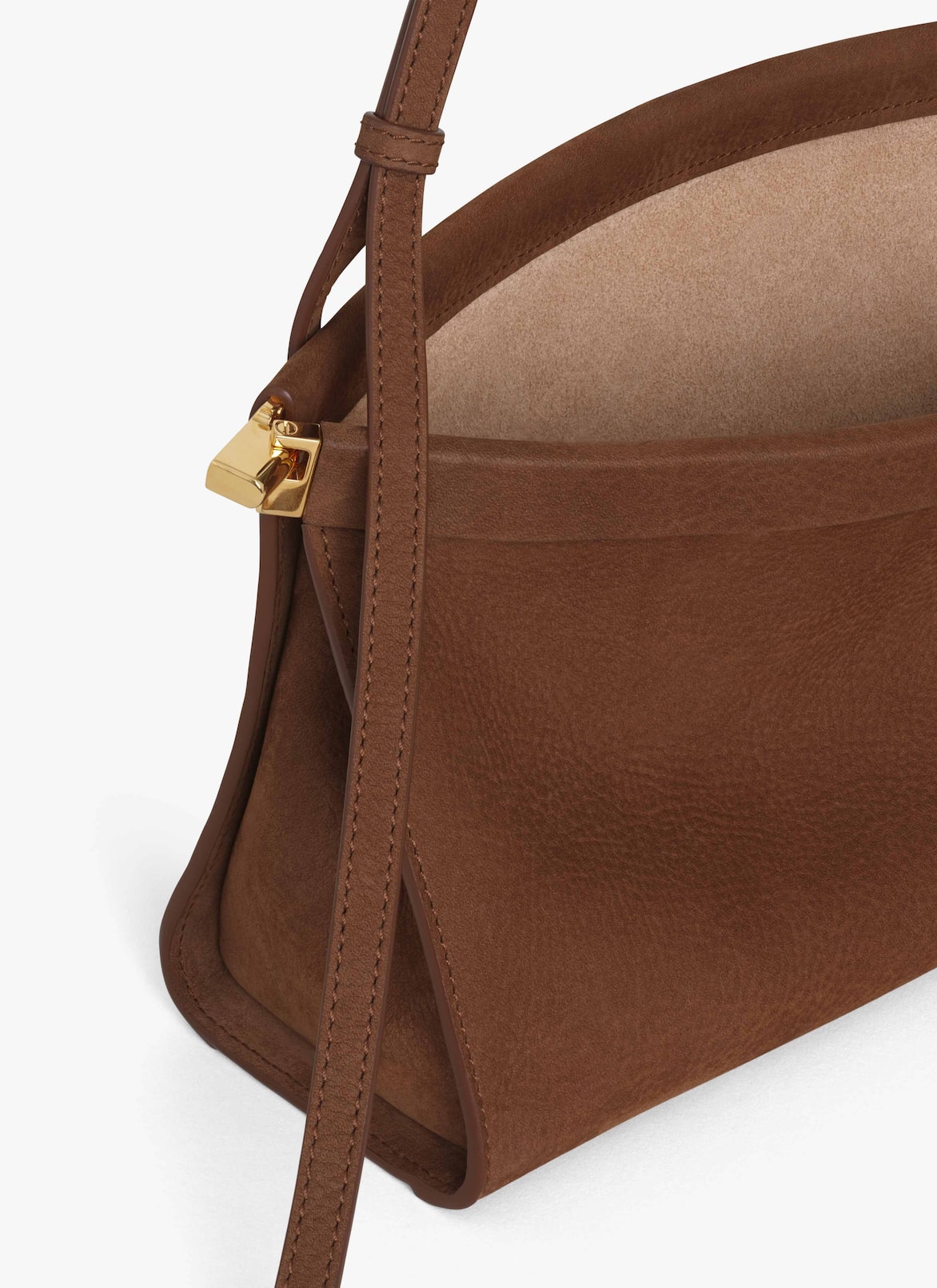 LE CLICK EAST WEST MEDIUM BAG IN NUBUCK ALAÏA UMBER LE CLICK EAST WEST MEDIUM BAG IN NUBUCK